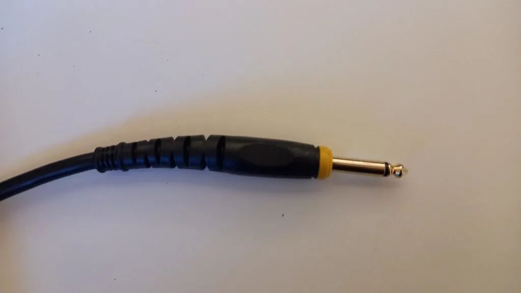 A TS cable with a quarter inch jack