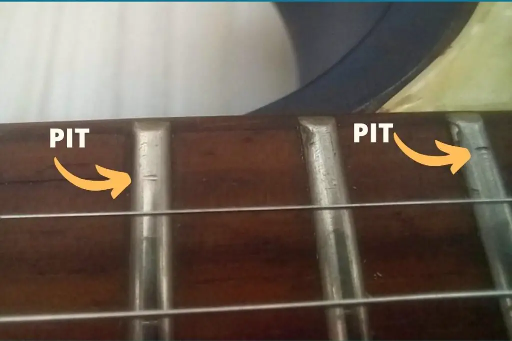 Fret pitting caused by fret wear