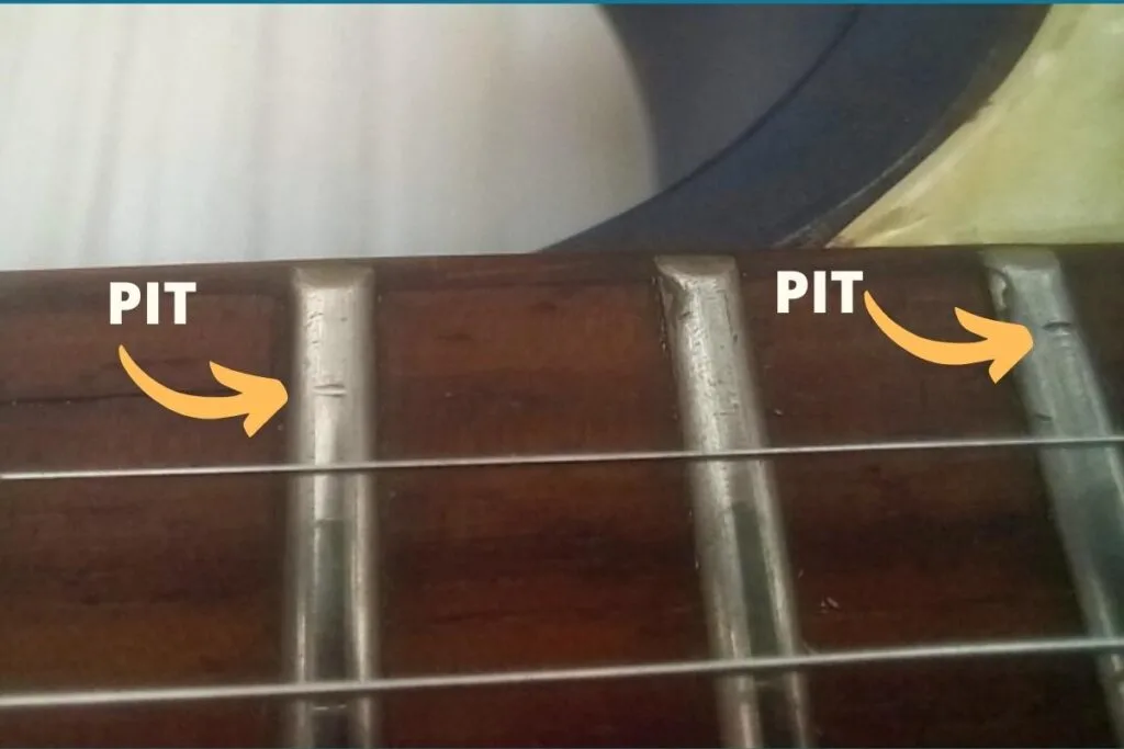 Fret pitting caused by fret wear