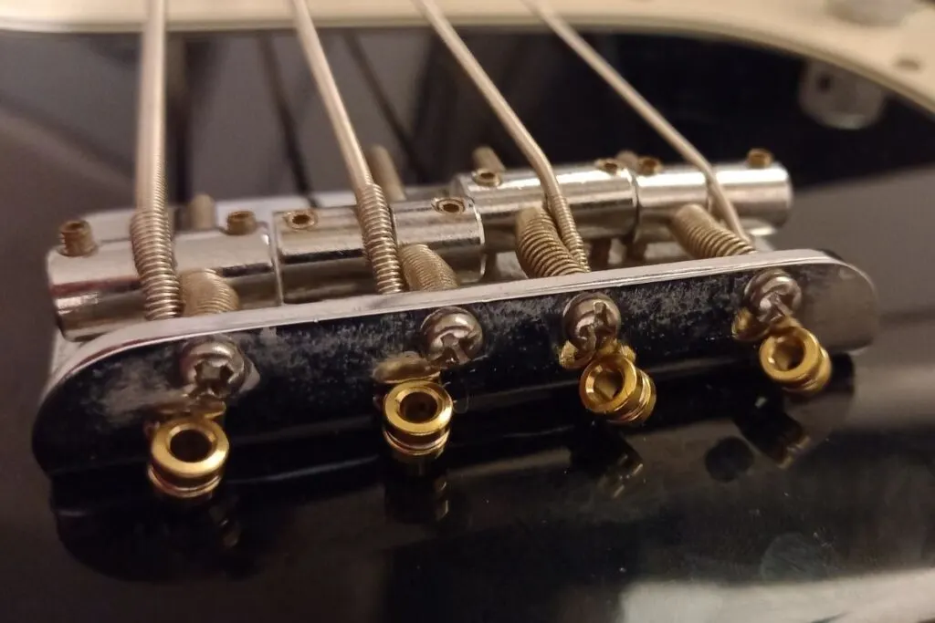 Bass guitar saddle screws