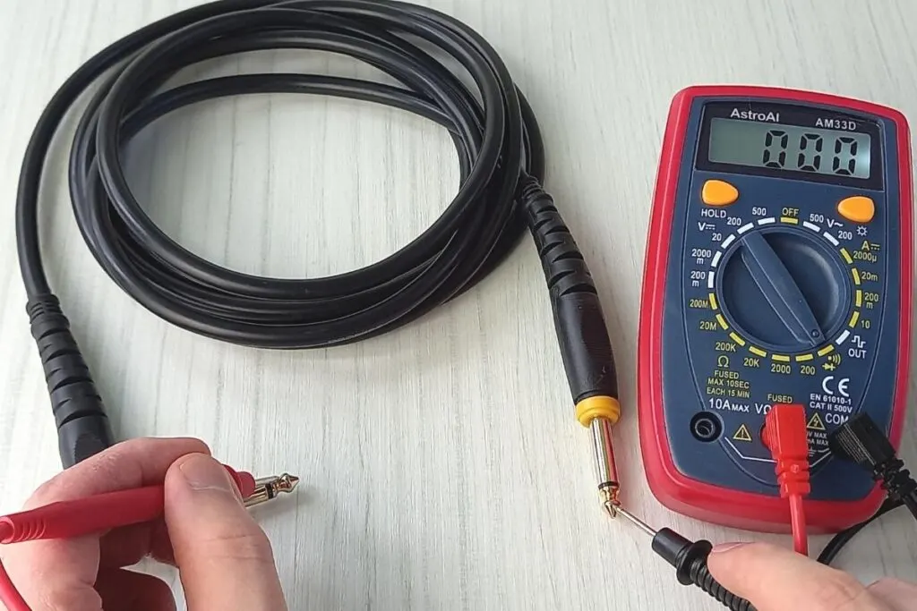 Testing a guitar cable with a multimeter