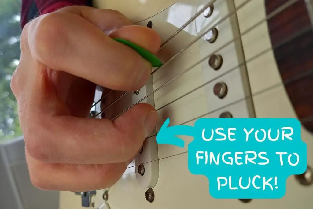 how to use a guitar pick