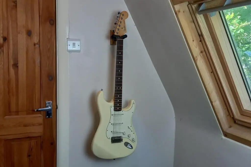 Wall-mounting a guitar