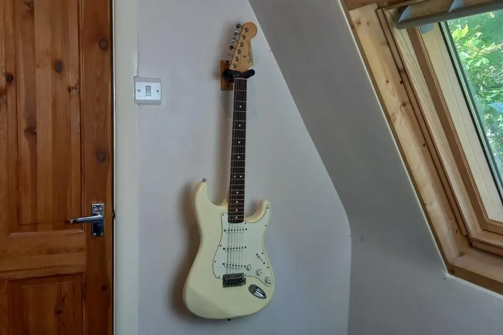 Wall-mounting a guitar